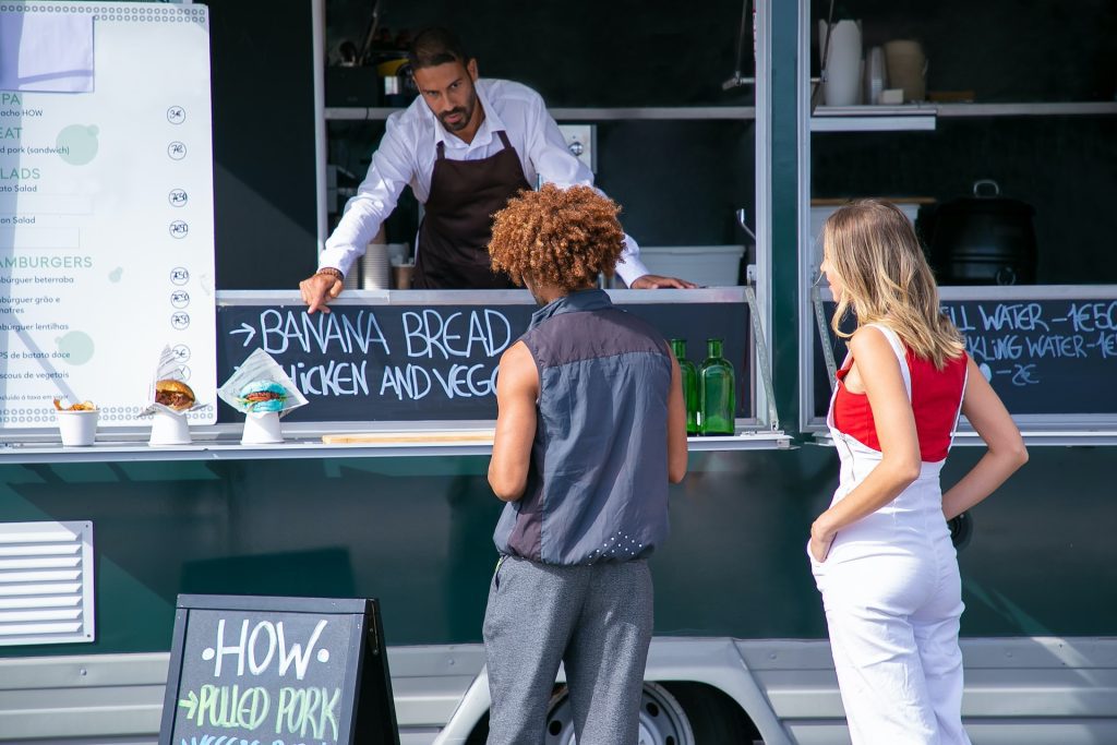 Food Truck Interaction Customers Ordering at a Street Food Stall Market to Thrive! Thrive with marive